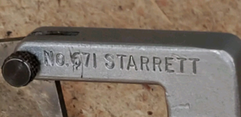 Starrett No. 671 - universal attachment for dial indicators with two arms