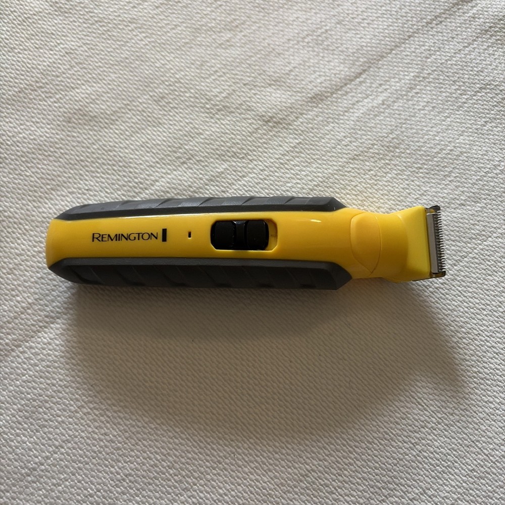 REMMINGTON CORDLESS RAZOR MODEL # UA 050035E