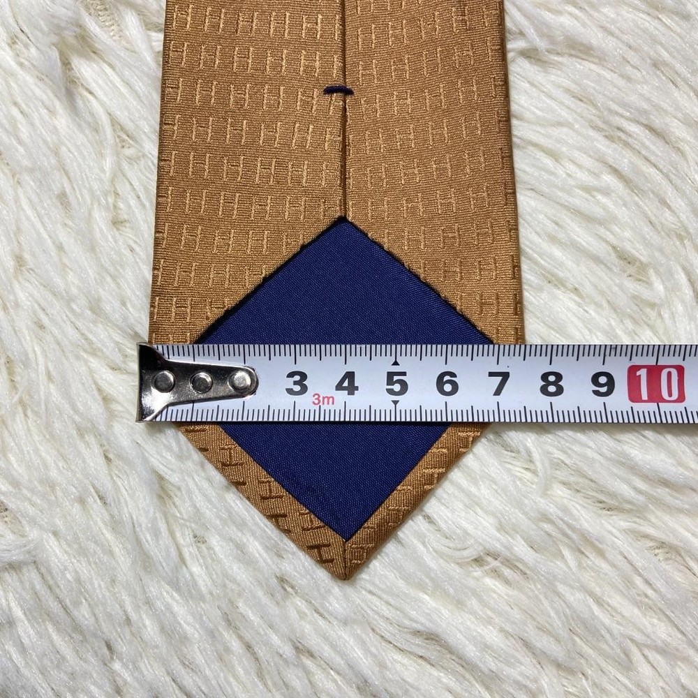 Fasone gold beige H pattern tie glossy
