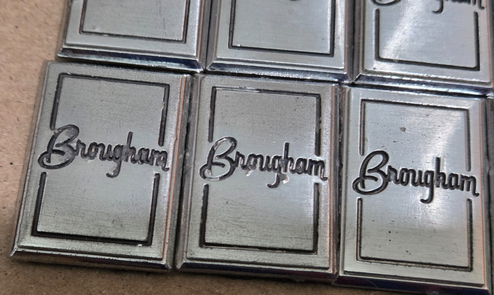 (2) OLDSMOBILE BROUGHAM CIRCA '80S SAIL PANEL EMBLEMS 1" (5604}