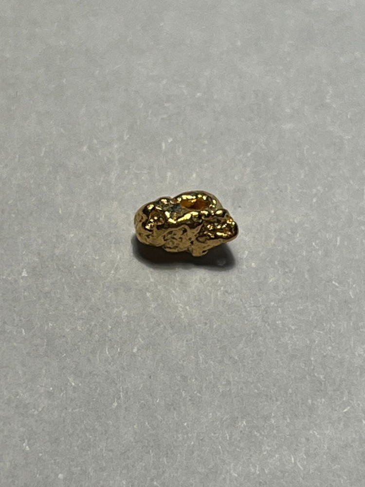 ALASKA GOLD  NUGGET .63 GRAMS NICE