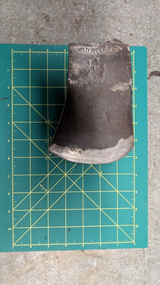 Kelly works axe and tool