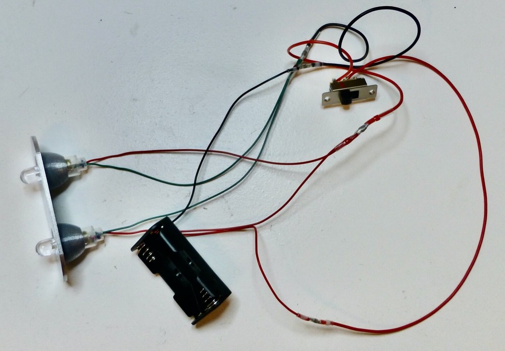 Electrical innards for men's Murray Jet Fire bicycle tank light