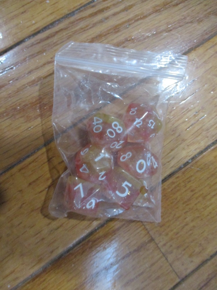 7 Piece Polyhedral Resin Dice Set Light Orange w/Black