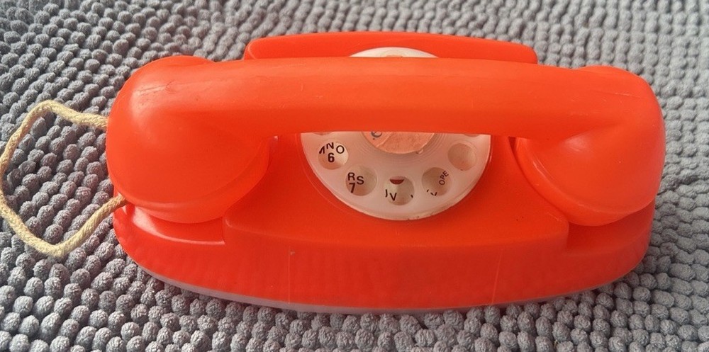 Vintage Evenflo Plastic Orange Dial Phone Toy
