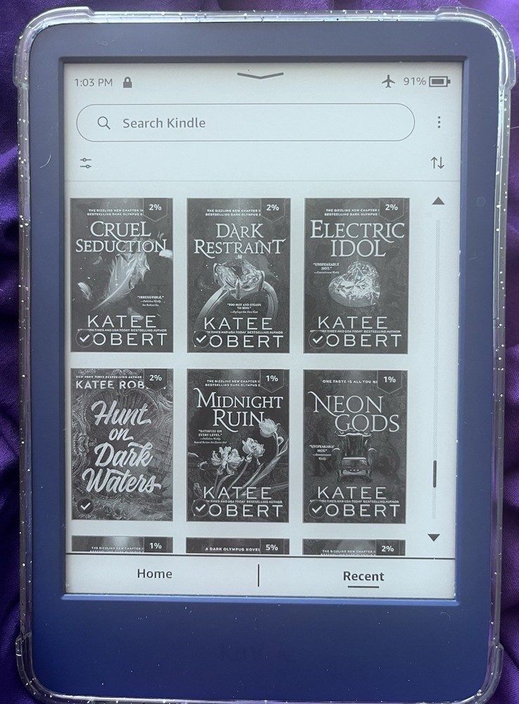 Amazon Kindle ereader Blue with books