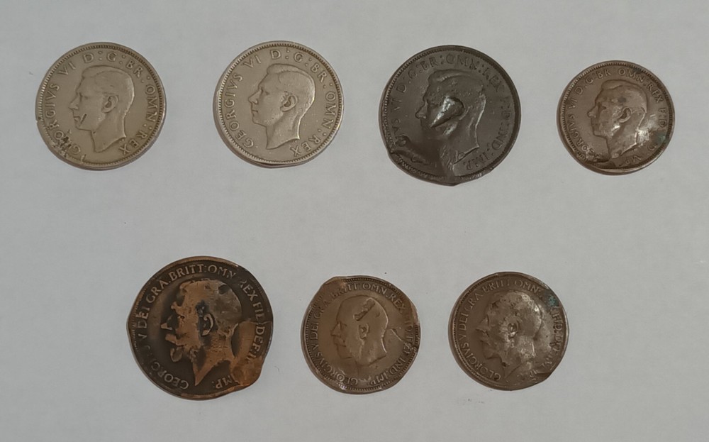 George V and George VI coins with error
