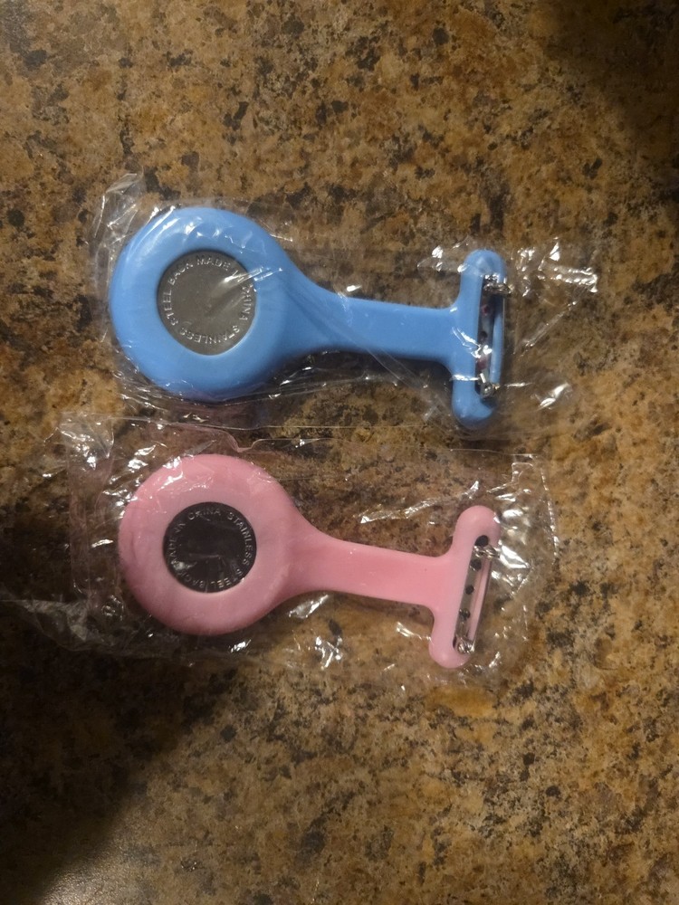 Nurses Clocks With A Pin To Put On Scrubs While Working