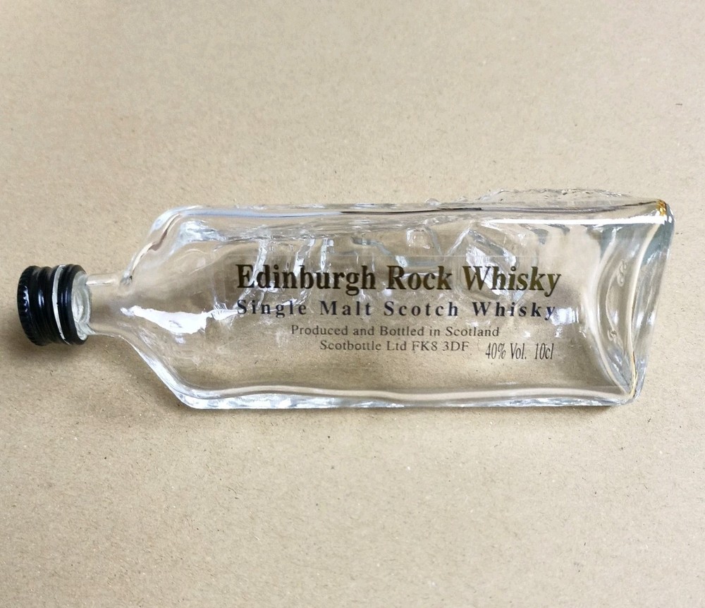 Collectable Edinburgh Rock Whisky bottle and presentation box 10cl. EMPTY.