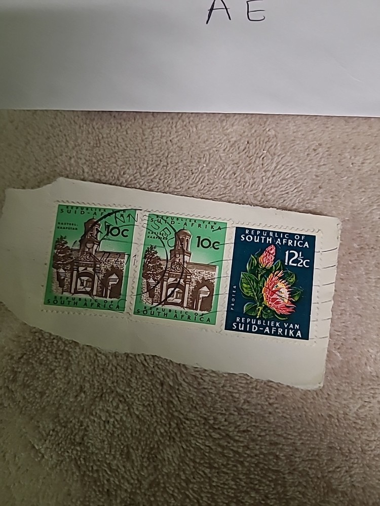 THREE SOUTH AFRICA STAMPS -(ENVELOPE AE)