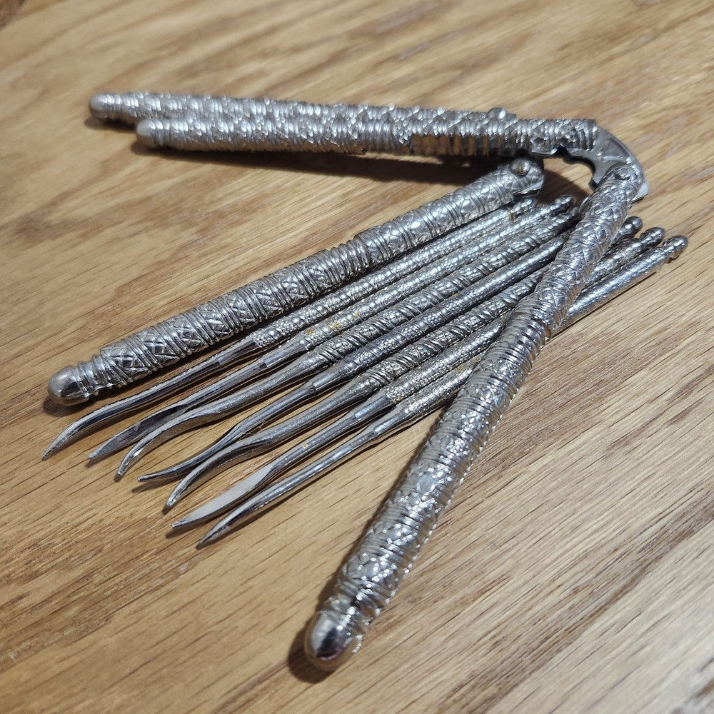 2 Vintage Metal Nut Crackers and 7 Pick Tools