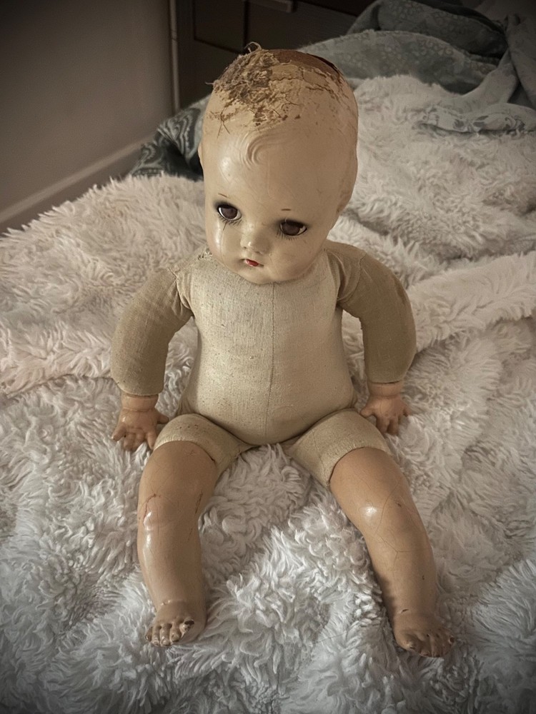 Haunted 1800s composition doll