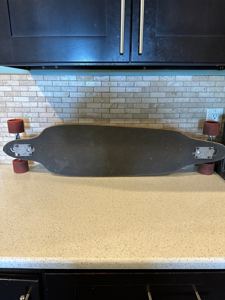 Catalyst longboard with gull wing trucks