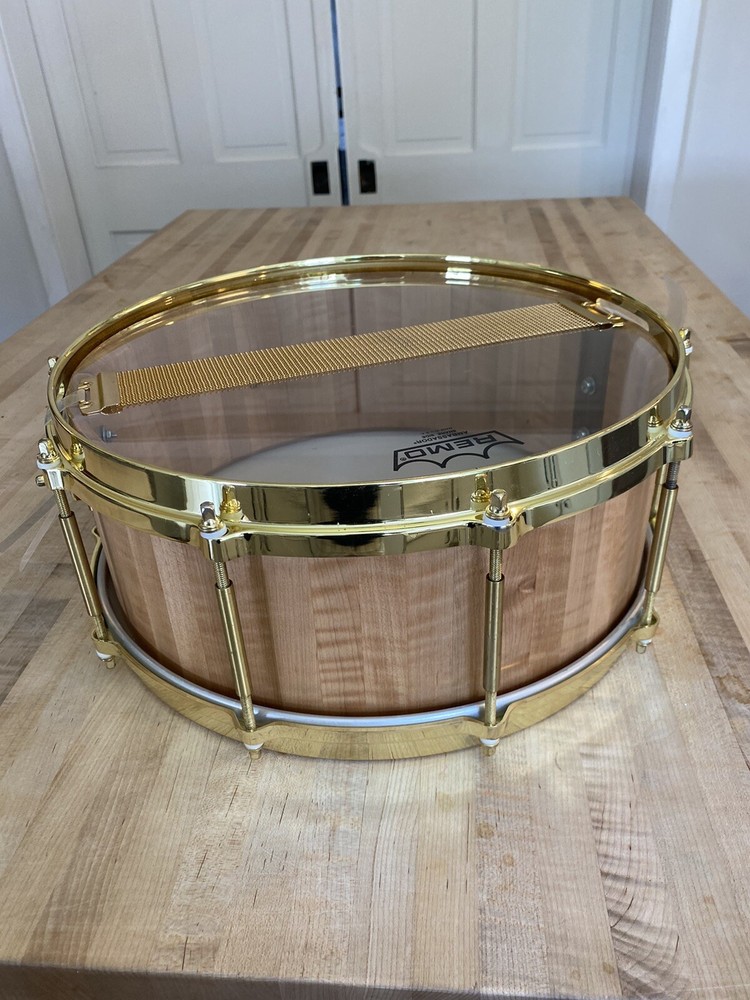 5 1/2 x 14 Custom made snare drum. Curly Maple Stave shell.