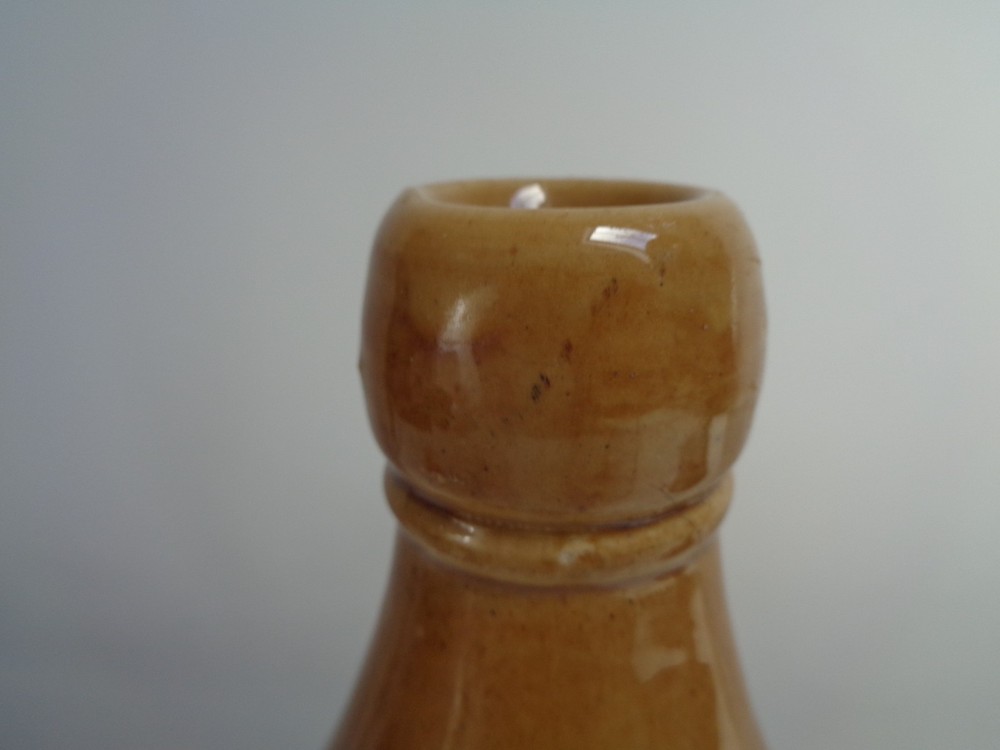 An Old MACFARLANE & SONS Stoneware Bottle Weston Super Mare Burnham