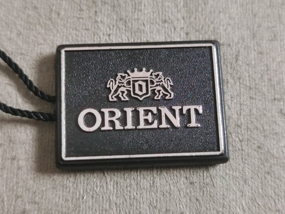Vintage Black Plastic Tag Good Condition Orient