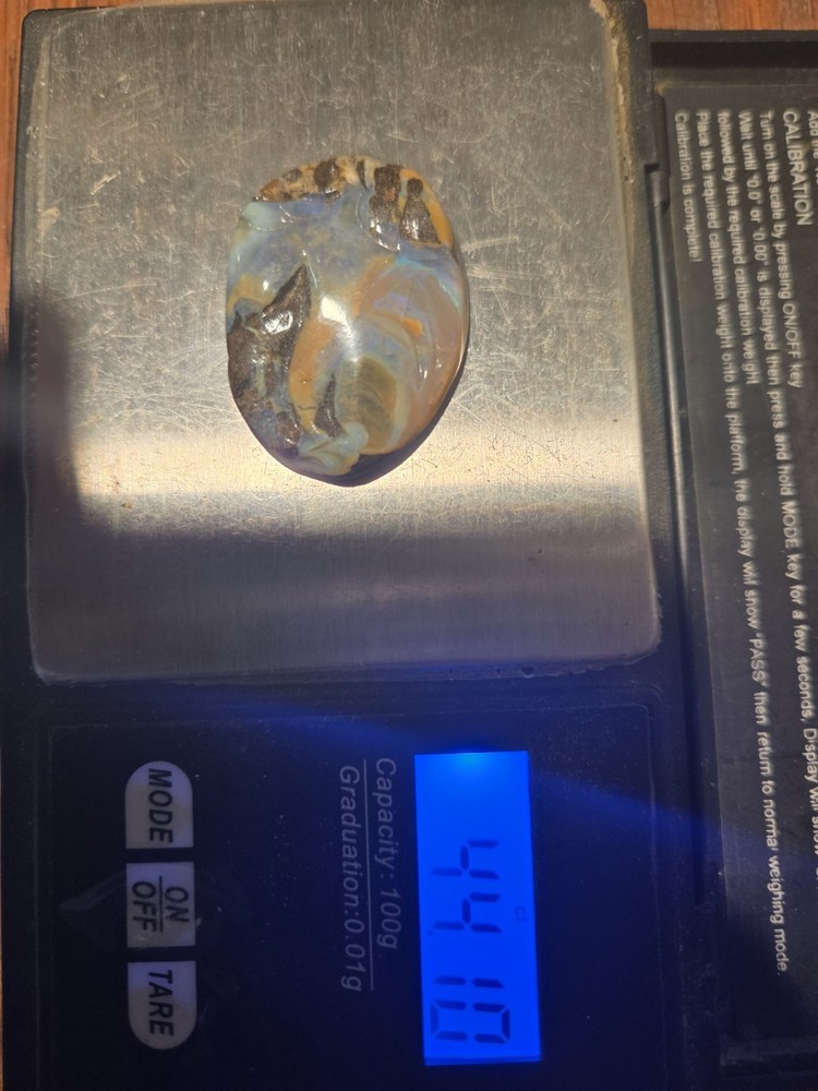 Carved Boulder Opal Stone