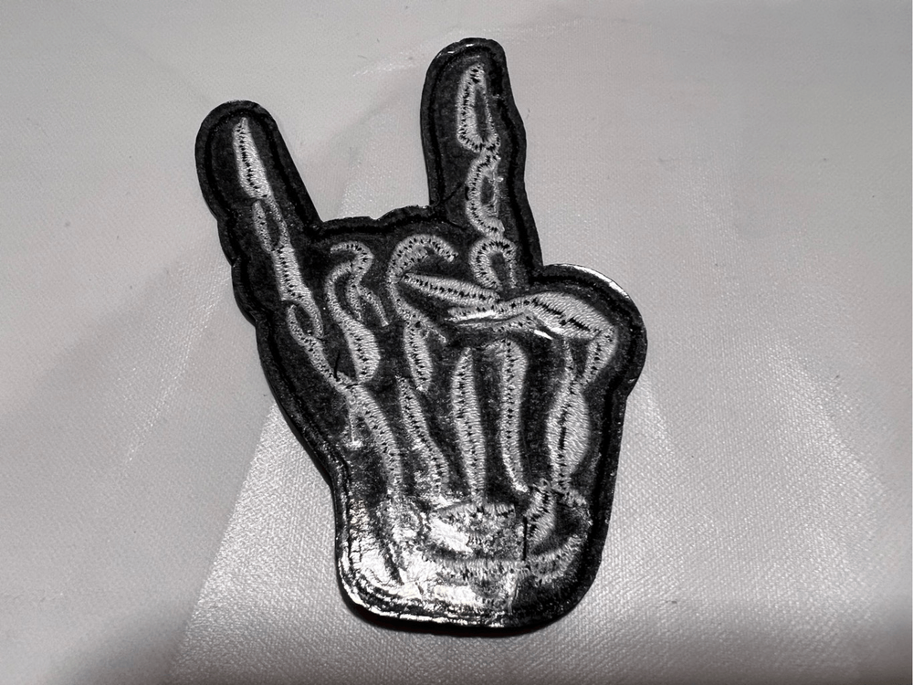 Skelton Hand Showing Horns Iron on Patch