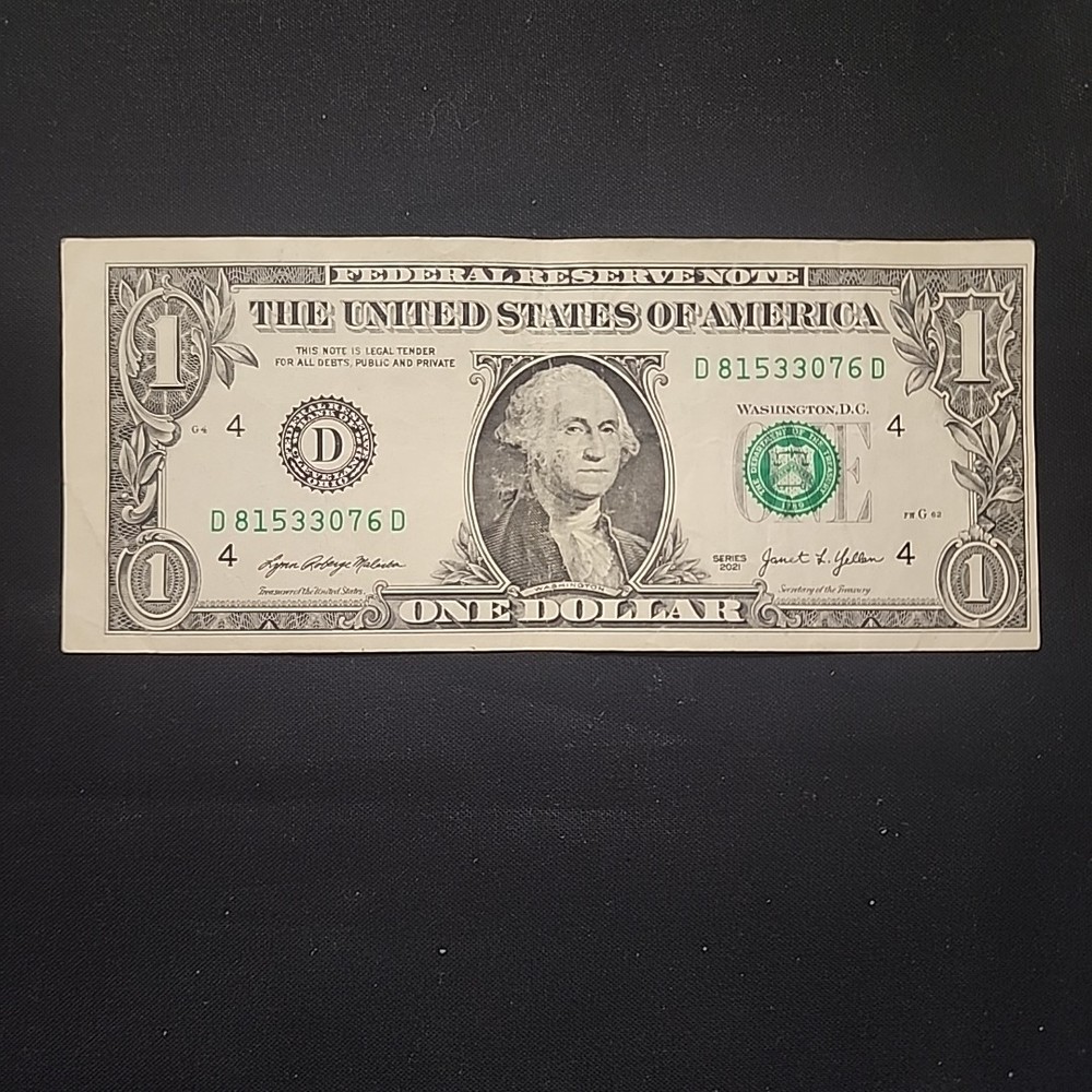 ERROR MISALIGNED MISCUT. ONE DOLLAR BILL
