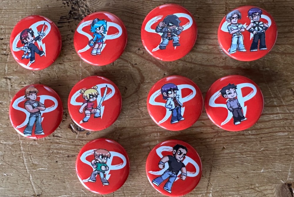 SCOTT PILGRIM VS THE WORLD THE GAME SDCC 2010 COMIC CON PINS BRYAN LEE BUTTON