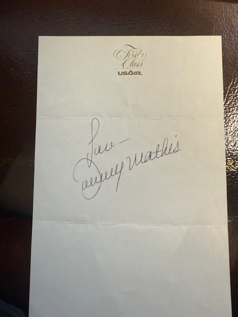 Johnny Mathis autograph - First Class passenger on USAir