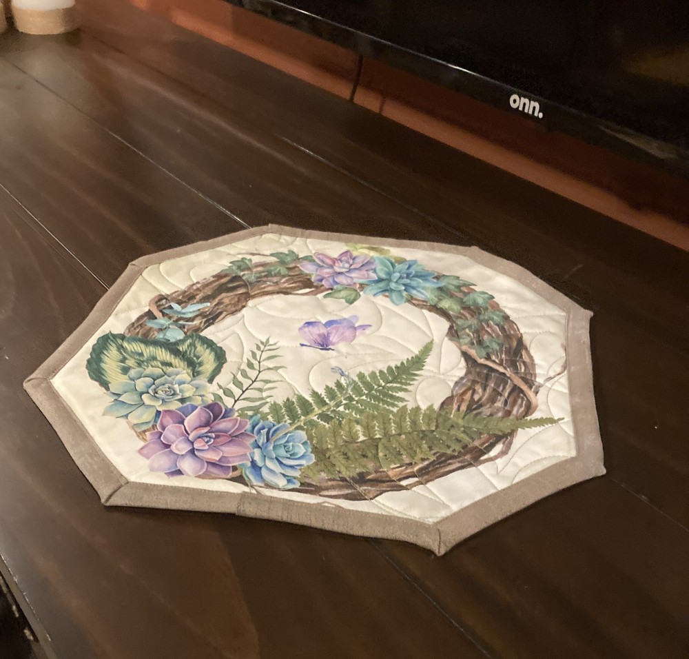 April Enchanted Garden Octagon Quilted Table Topper