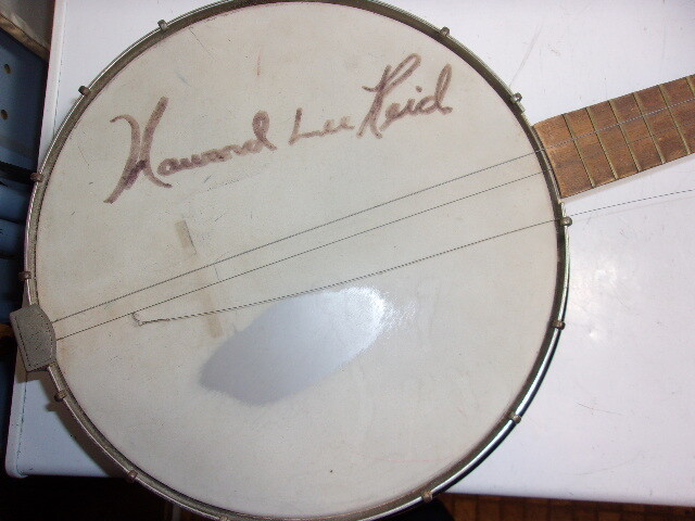 Silvertone banjo 4 string signed by Howad Lee Reid