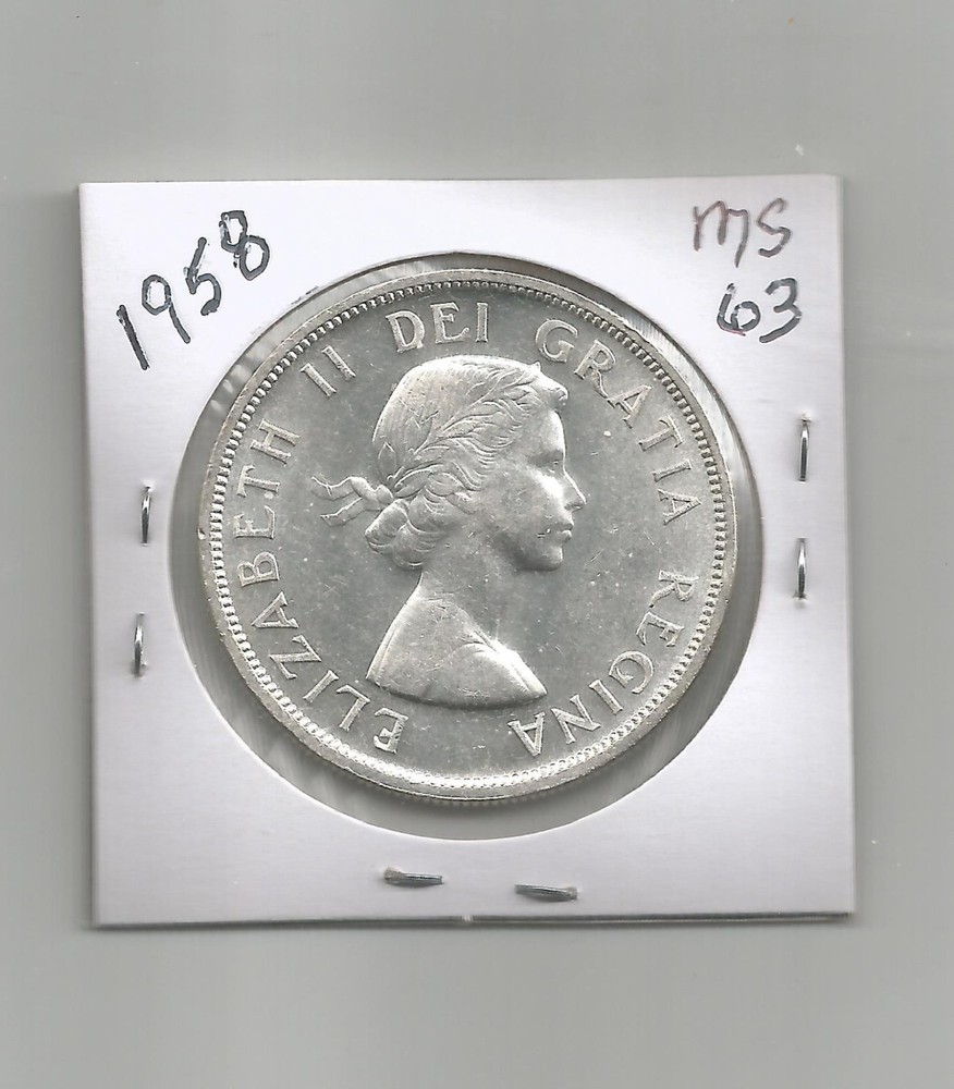 **1958** Canadian Silver Dollar - MS63 or better