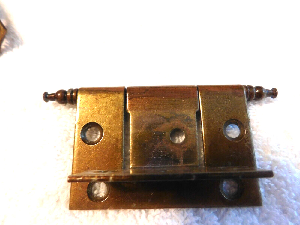 8 ANTIQUE BRASS 1" DOOR HIDDEN HINGES.