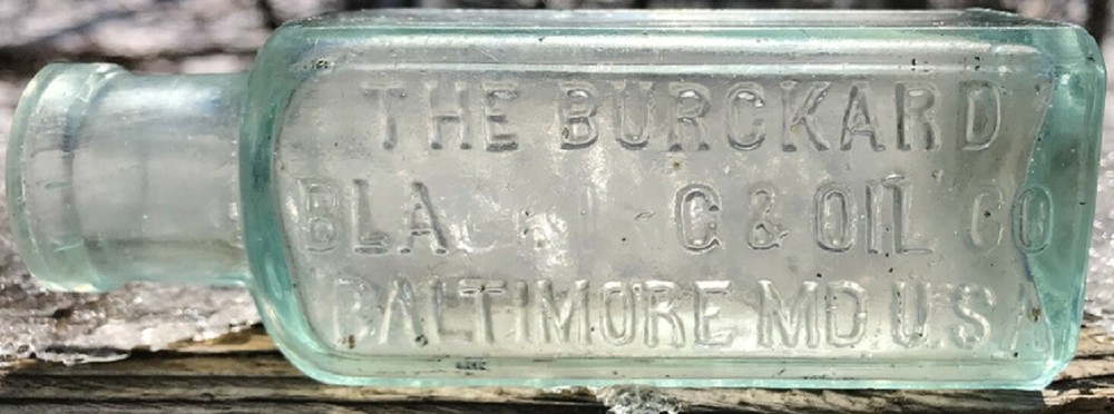 THE BURCKARD BLA_ _ _  _G (BLACKING) & OIL CO. BALTIMORE MD. U.S.A. Error Bottle