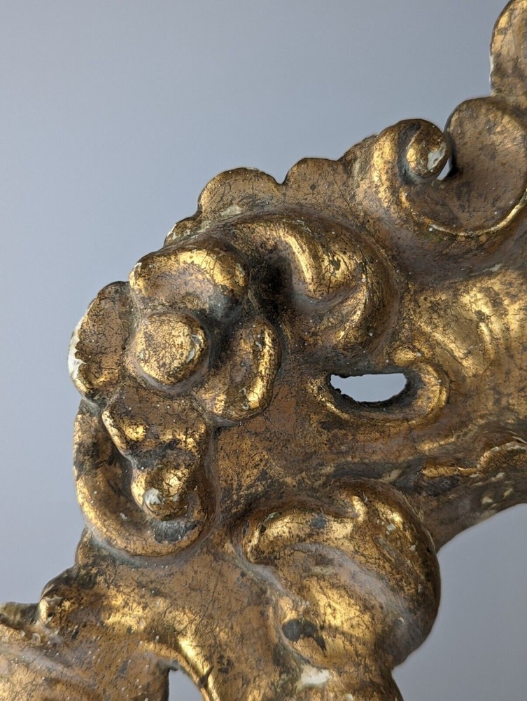 Antique gilt stuccoed wood frame