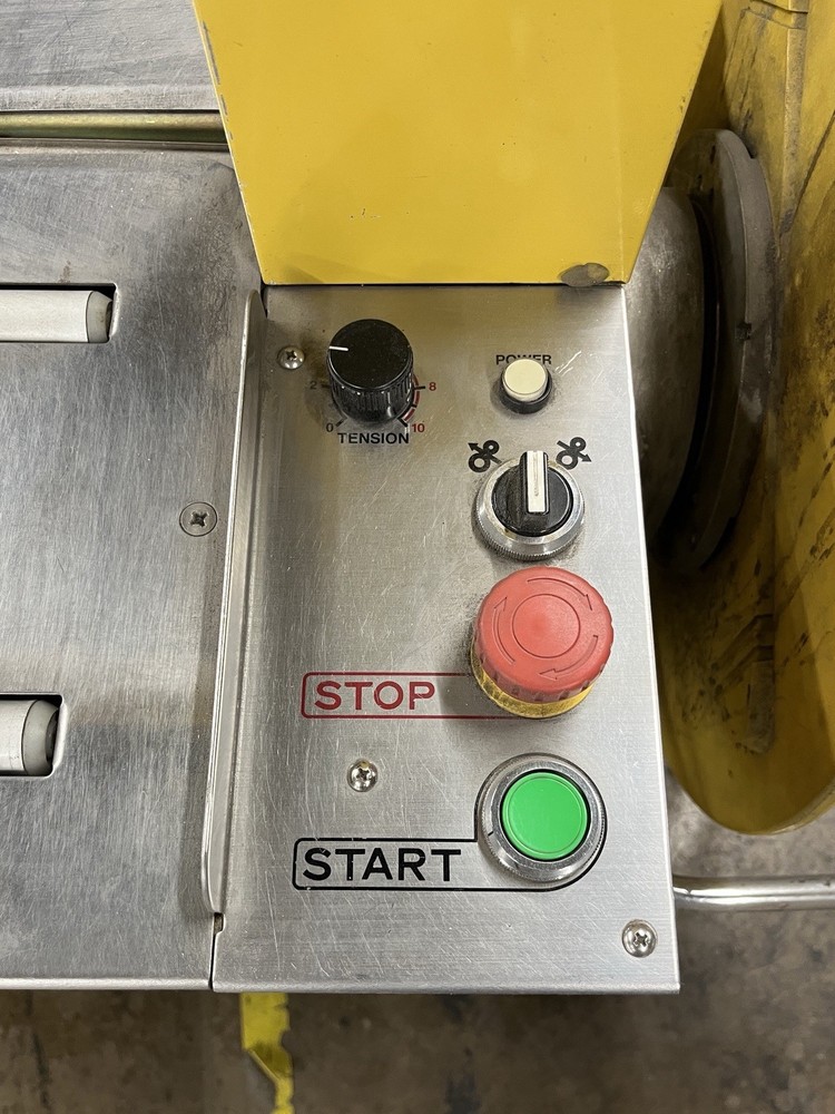 StraPack RQ-8 nylon strapping machine.