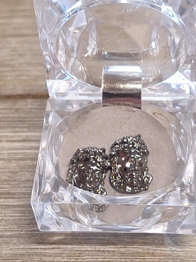 Christian Silver Tone Jeuse Face Earrings