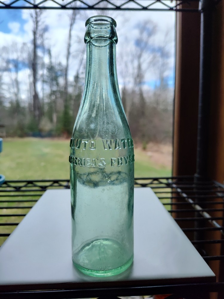 Vintage Pluto Water Bottle America’s Physic Devil Embossed Green