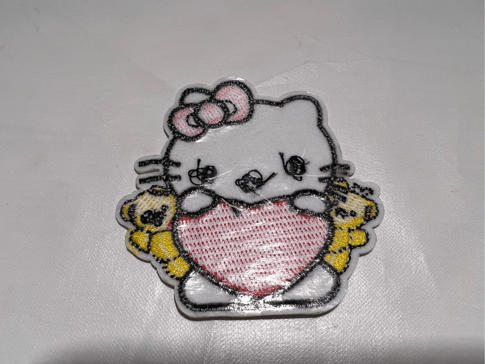 Hello Kitty Holding a Heart Iron on Patch