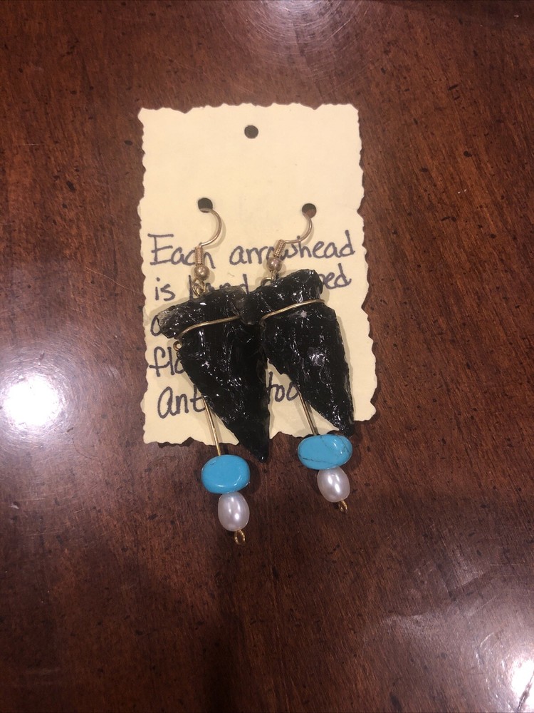 Pair Of Arrowhead Earrings With Beads
