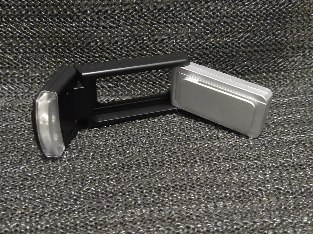 Adjustable pocket Book Magnifier and Light Black and Silver.