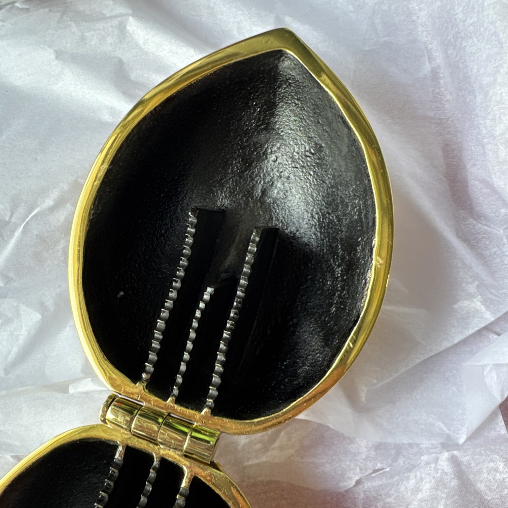 Tory Burch Brass "Robinson" Walnut Nutcracker