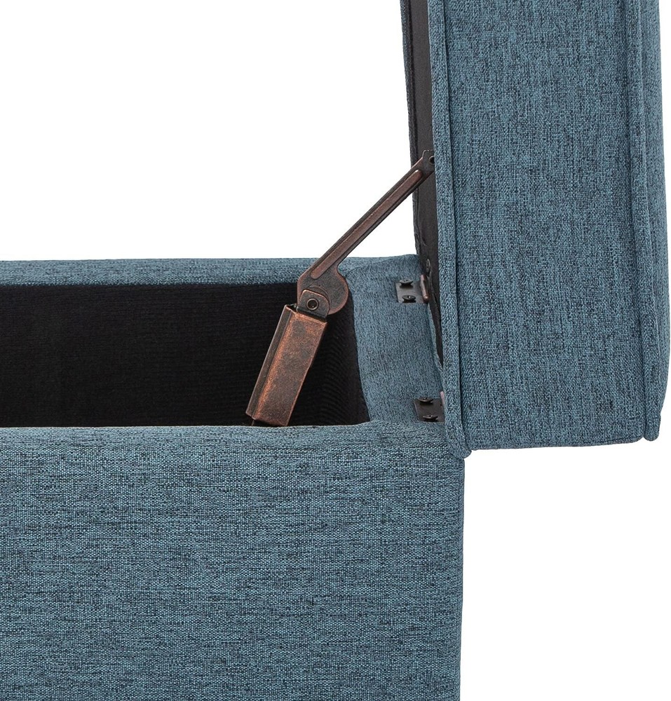 Blue storage bench with hinged lid and solid wood legs, linen-covered footstool