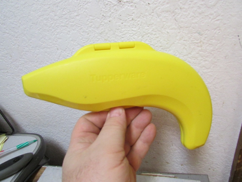 Vintage Tupperware banana keeper! this is a great decor item & useful even