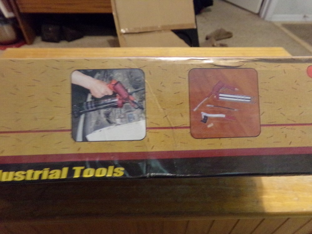 CUMMINS AIR POWERED GREASE GUN. OPEN BOX.