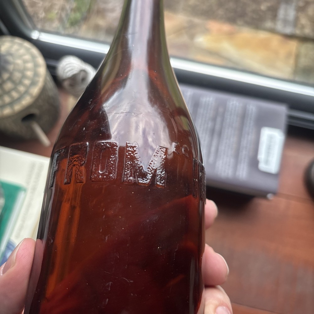 Stains Run From 101 Amber Embossed Bottle