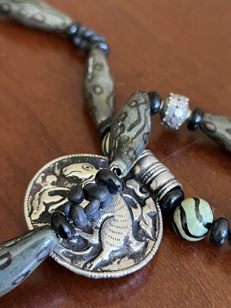 hand crafted beaded necklace Whit Carved Pendant