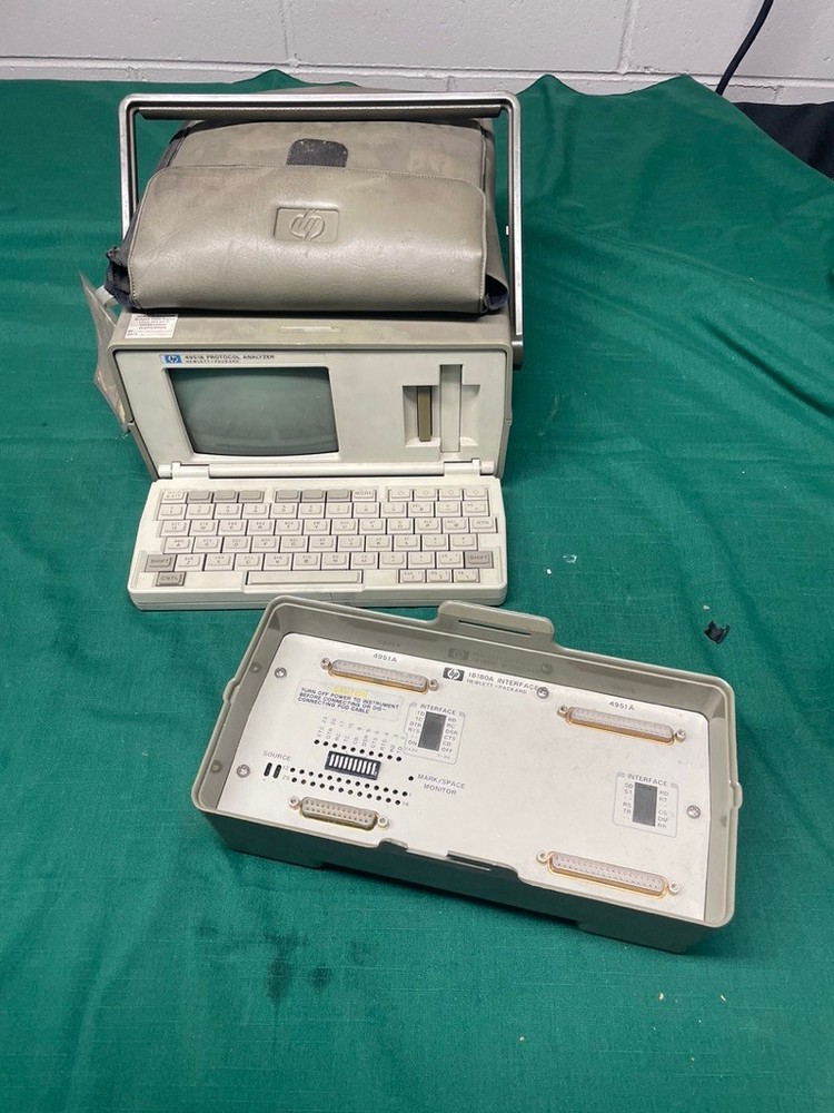 Hewlett Packard HP 4951A protocol analyzer with accessories 18180A interface