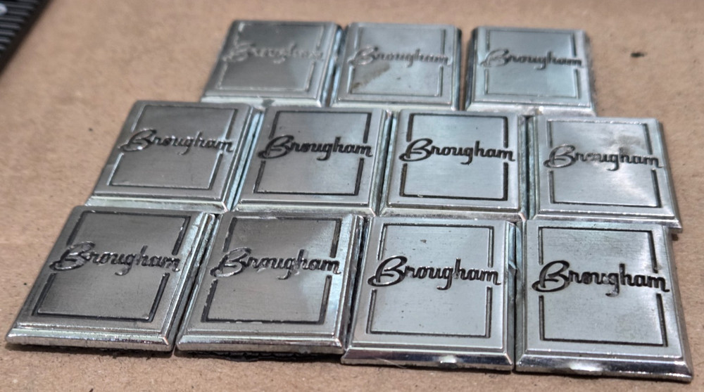 (2) OLDSMOBILE BROUGHAM CIRCA '80S SAIL PANEL EMBLEMS 1" (5604}