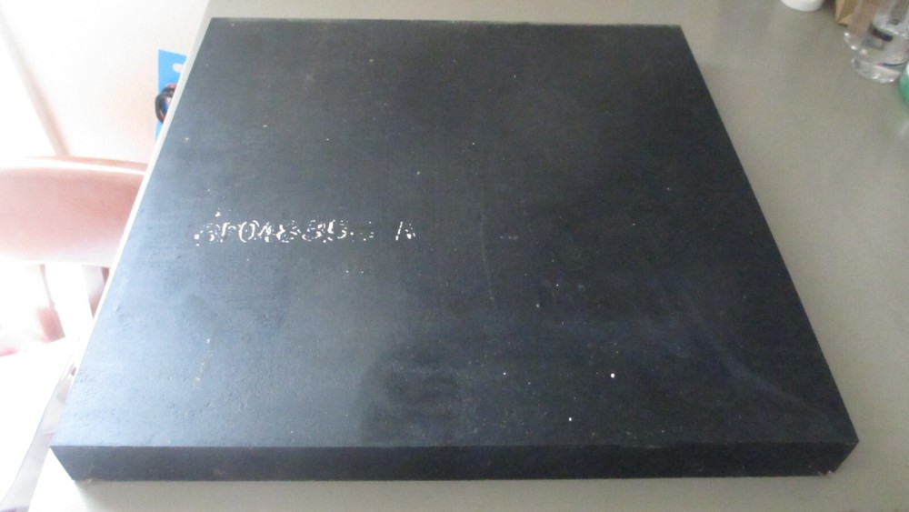 12" by 12" by 1 1/8",  8 pound  Rubber Pad