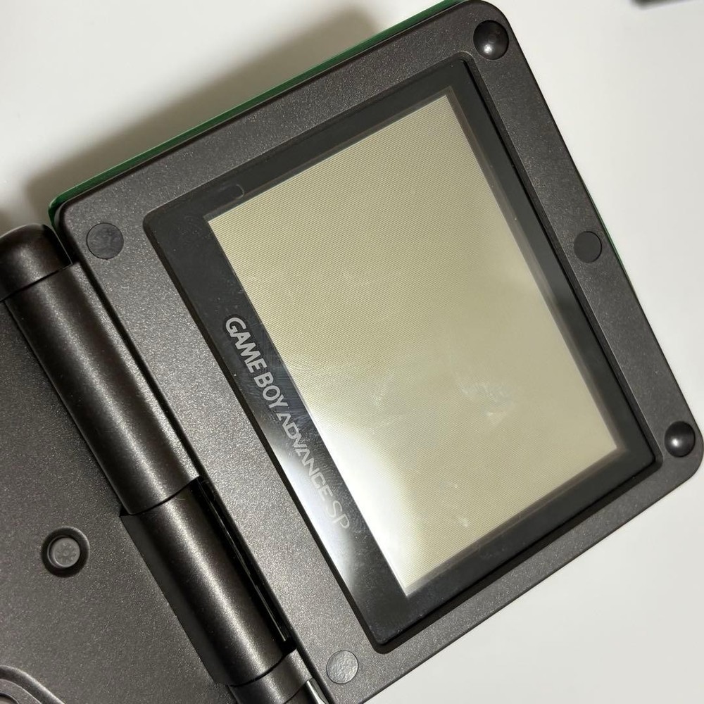 Game Boy Advance SP Green + 4 Games