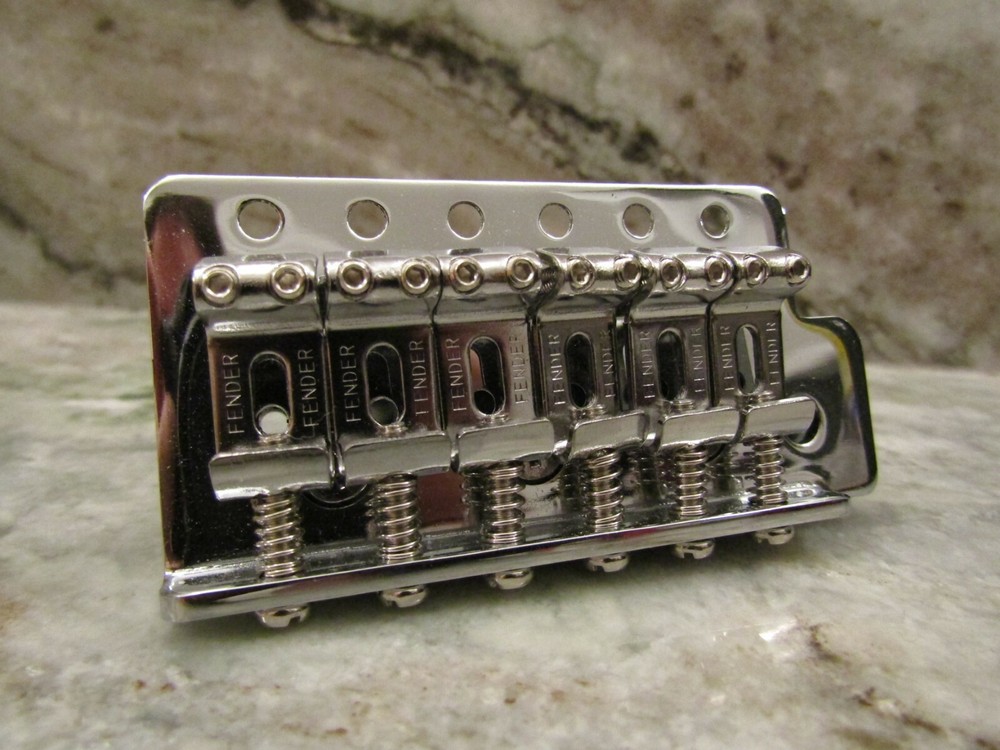 HOLDER  - UNDER CONSTRUCTION - FENDER VINTAGE BRIDGE IN CHROME