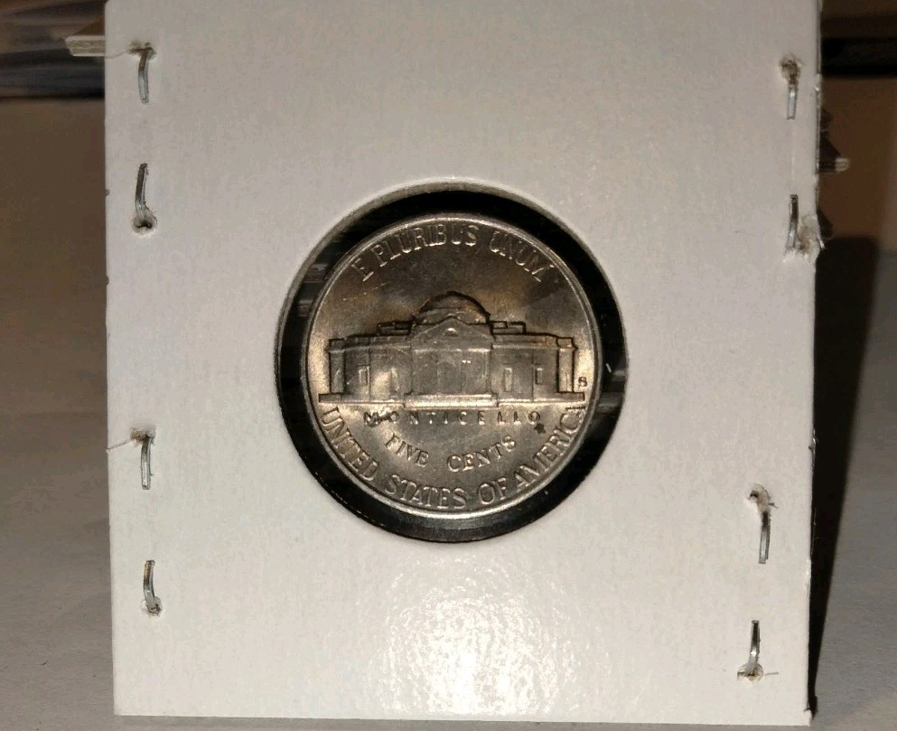 1951 S JEFFERSON NICKEL STRIKE THRU ERROR