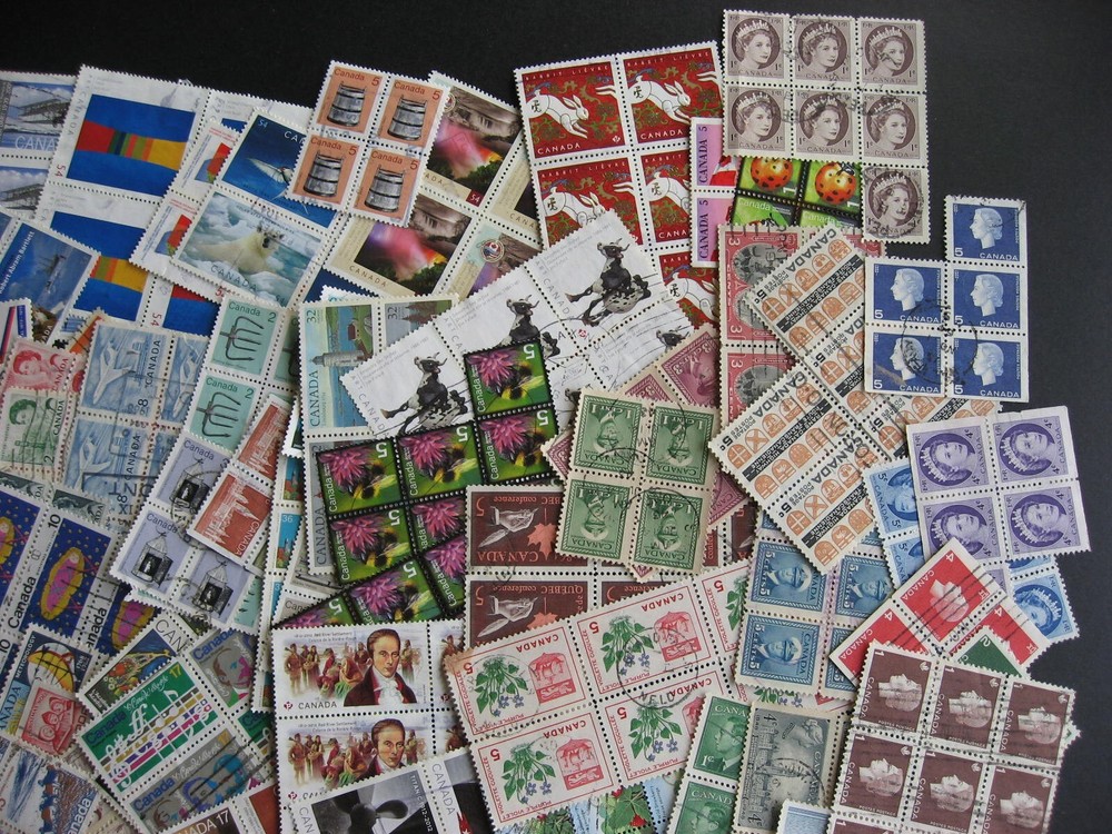 Canada 130 used blocks of 4 or more, virtually all different, mixed condition
